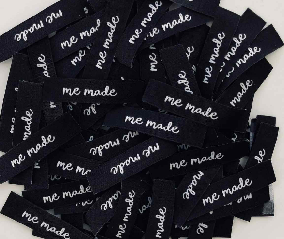 classic woven labels with white text